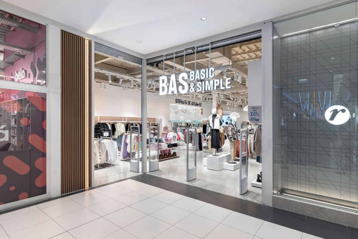 BAS Store - Modern retail storefront with glass facade, wood slats, and 'Basic & Simple' signage - Contract Workplaces (1)(0).webp